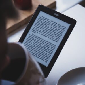 photo of someone reading a kindle
