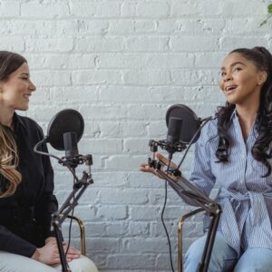 photo of 2 female podcasters